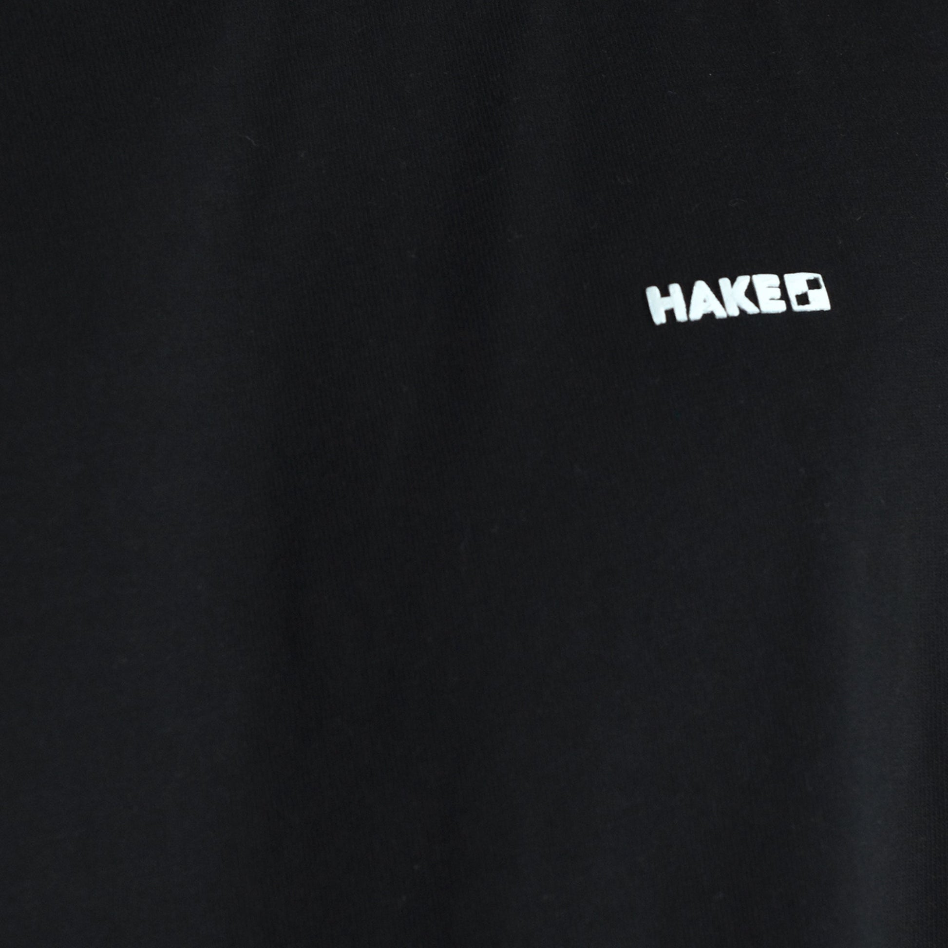 HAKE - camiseta negra over sized